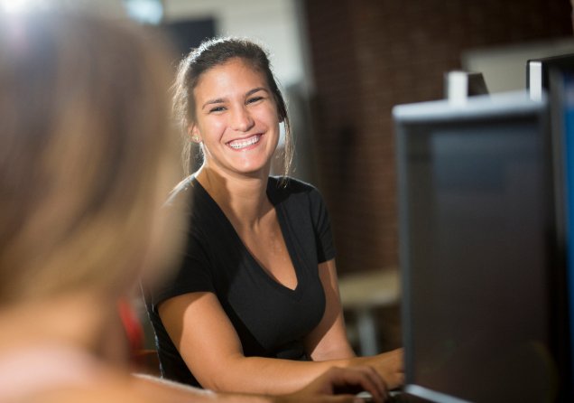 a student posing and smiling