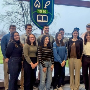 Students posing for a picture during the Commitment to Excellence Pledge