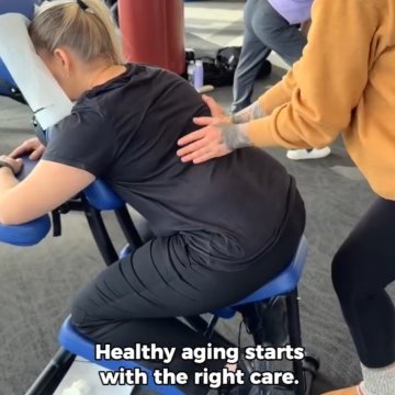 a massage therapy student practicing massage techniques on a patient