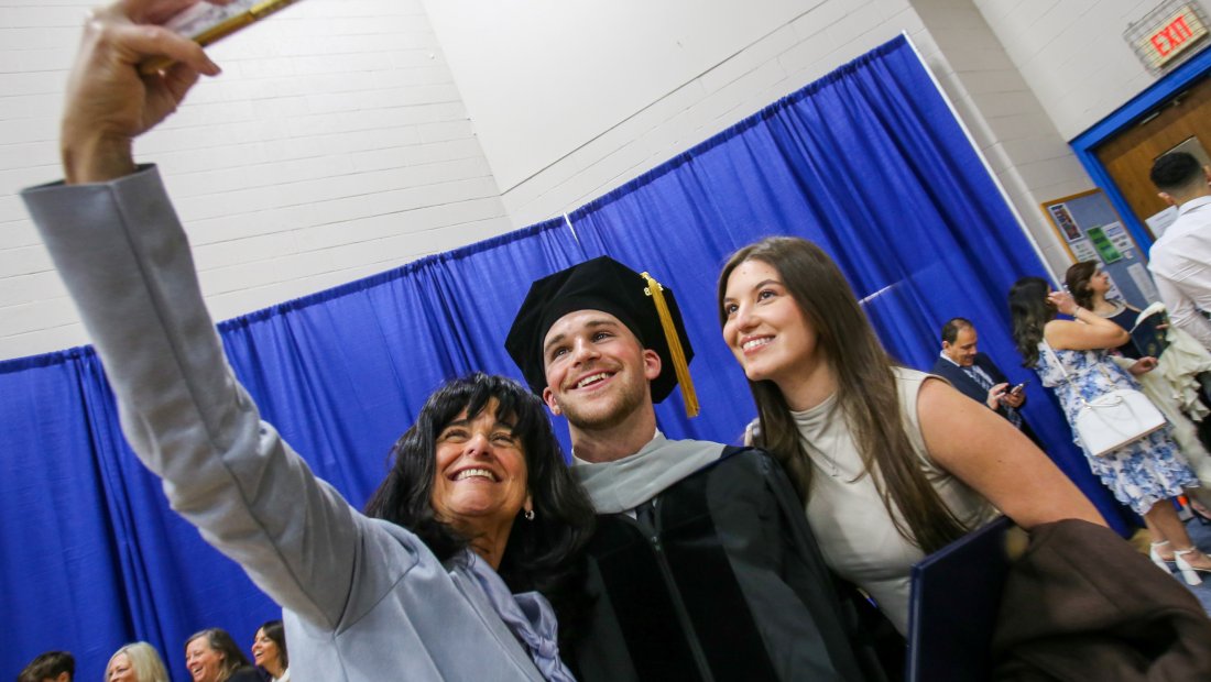 Family taking a selfie with their D.C. Graduate