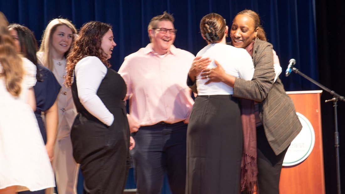 Undergrads talking at Pinning ceremony