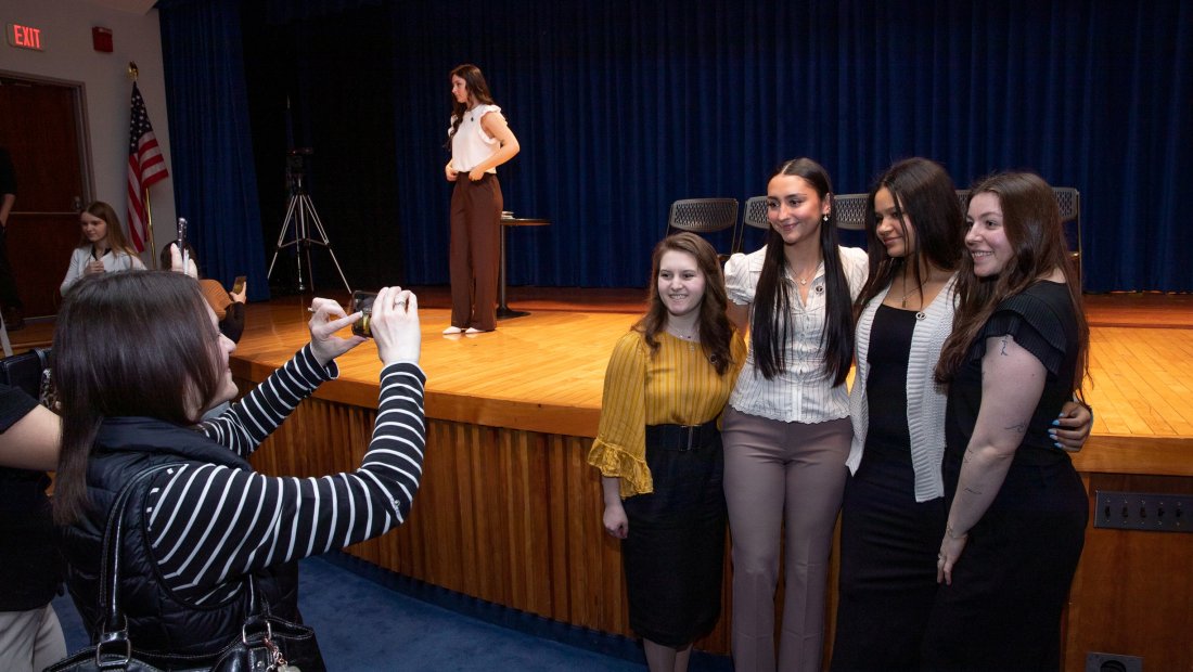 Undergrads taking a photo at Pinning Ceremony