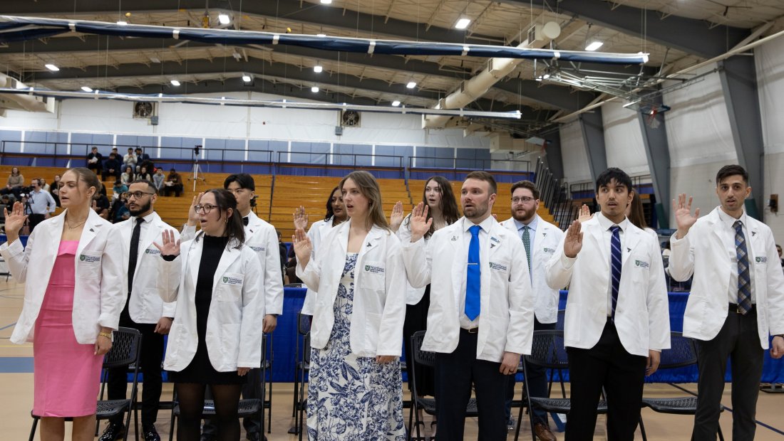 Students standing at Transitions Ceremony