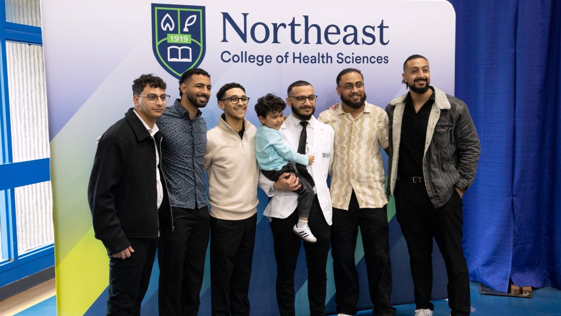 7th Trimester student posing for a photo at Transition Ceremony