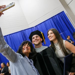 Family taking a selfie with their D.C. Graduate