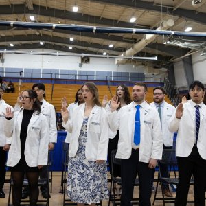Students standing at Transitions Ceremony
