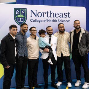 7th Trimester student posing for a photo at Transition Ceremony